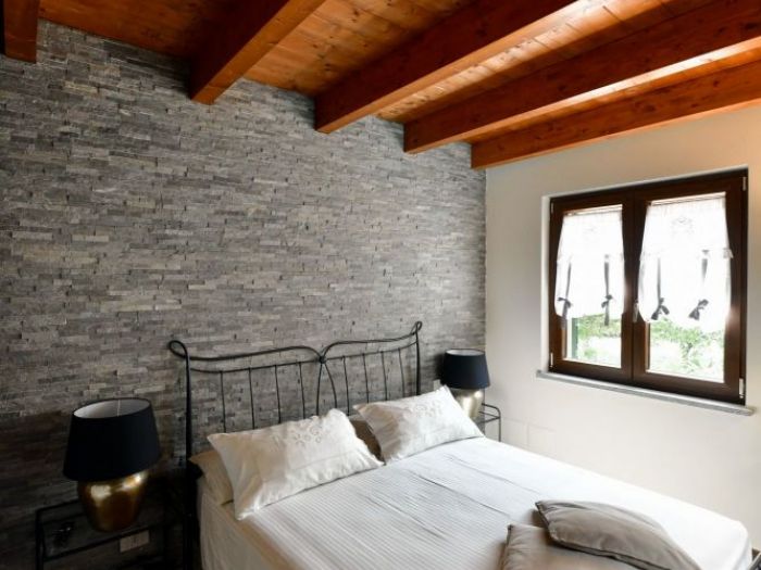 Archisio - Enrico Scarsi Fotografia - Progetto La pietra naturale eleganza senza tempo nella ristrutturazione valorizzata dalla fotografia