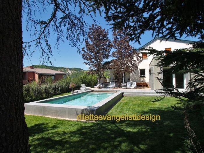 Archisio - Diletta Evangelisti - Progetto Restyling di villetta con aumento di volume e nuova piscina