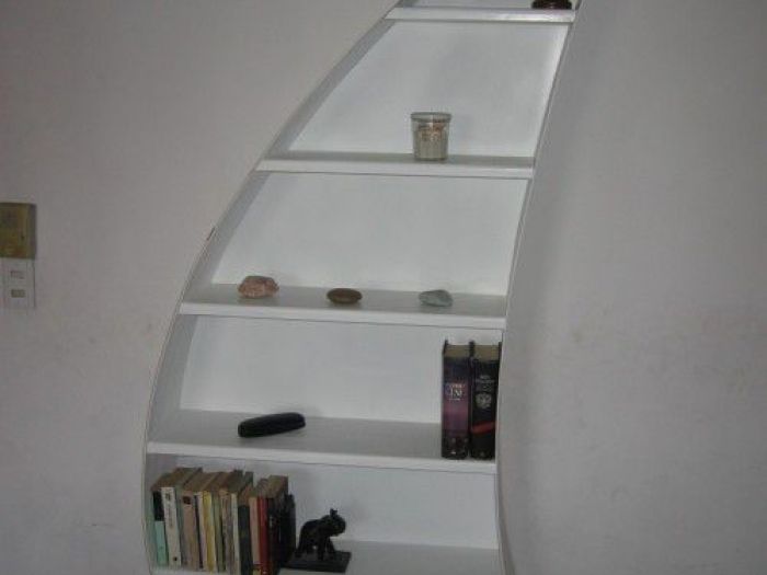 Archisio - Falegnameria Artigianale - Progetto Scaffale a forma di vela