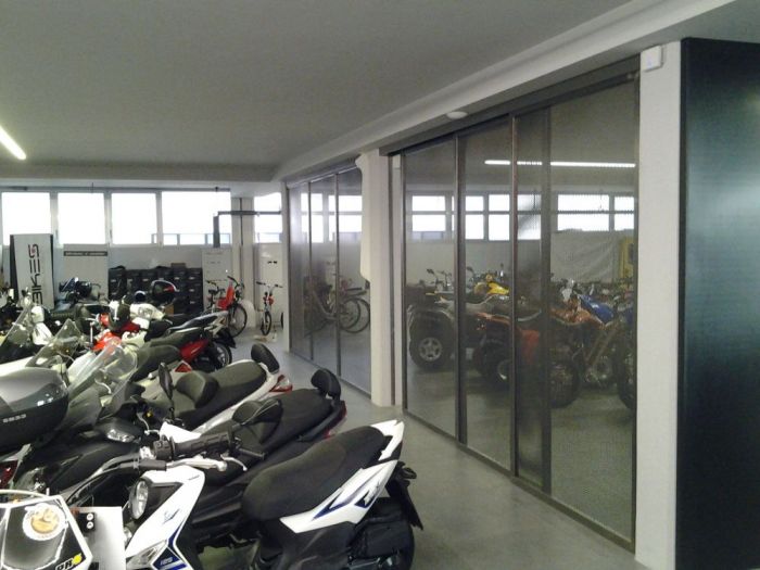 Archisio - Bravo Servizi Aziendali Di Bravo Maurino - Progetto Allestimento interno concessionaria