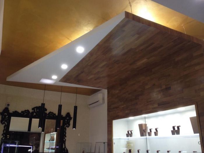 Archisio - Casesa Tiziano - Progetto Gioielleria piazza oro