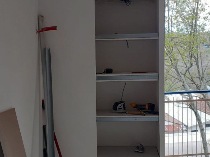 Archisio - Mani Srl Ristrutturazini - Progetto Realizzazione PrecedenteCamera da letto con armadio nascosto roma zona magliana