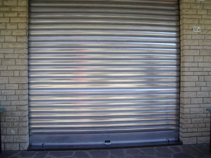 Archisio - Gr Porte - Progetto Porte residenziali - serrande e porte basculanti