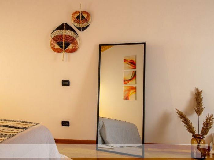 Archisio - Elisa Cattelan - Progetto Da una parete arancione ad uno stile etnic chic