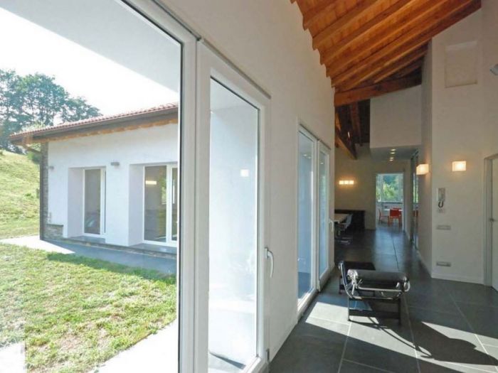 Archisio - Roberto Silvestri - Progetto Tetto in legno pietra e mattoni a vista