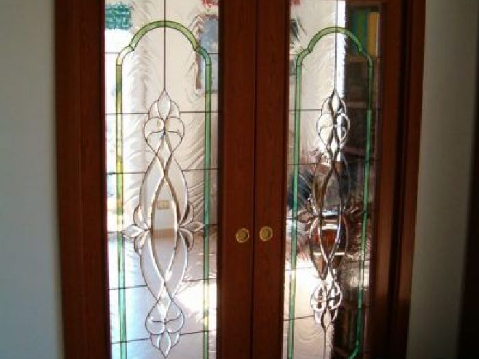 Archisio - Caleidos Creazioni Darte Snc - Progetto Vetrate per porte