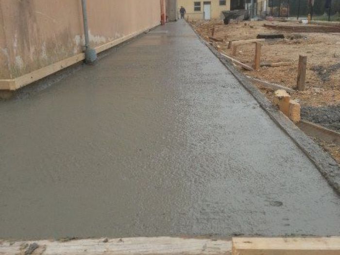 Archisio - Impresa Edile Antonelli E Gattari - Progetto Marciapiedi fioriere e pavimenti in porfido