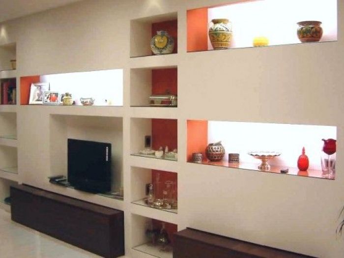 Archisio - Adesign - Progetto Parete attrezzata