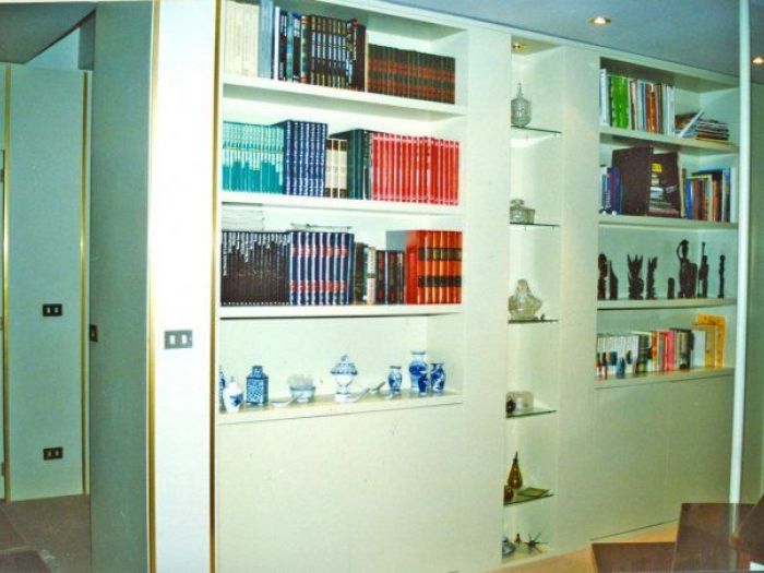 Archisio - Falegnameria Odino Egidio - Progetto Armadi librerie porte e scale