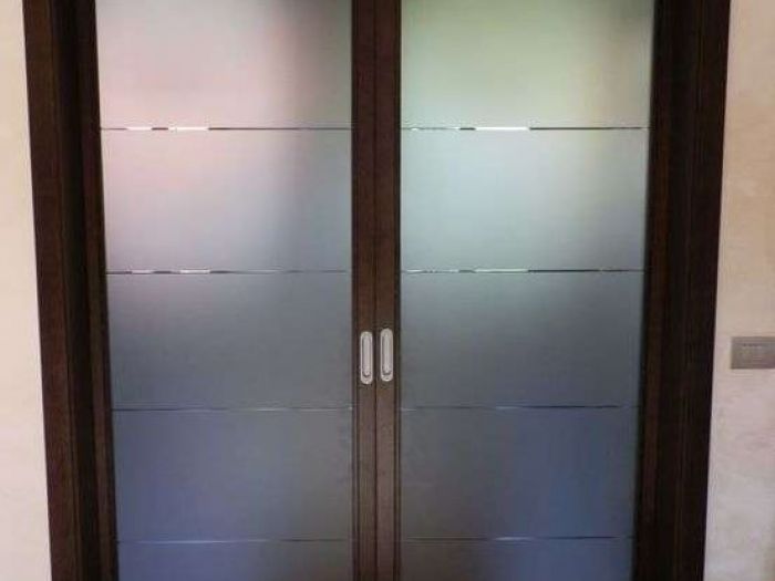 Archisio - Falegnameria Cavazzoni - Progetto Porte