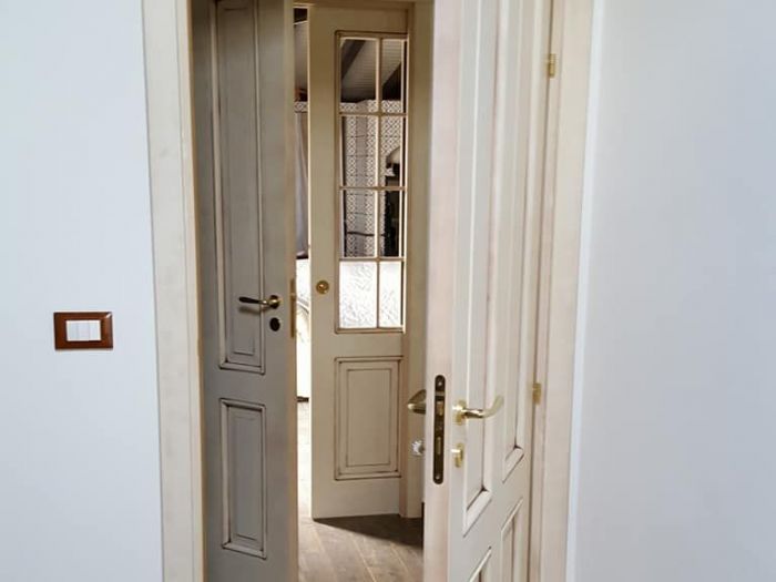 Archisio - Falegnameria Tuccitto - Progetto Porte in legno