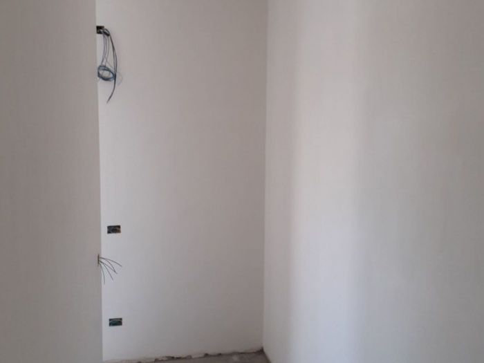 Archisio - Mani Srl Ristrutturazini - Progetto Realizzazione PrecedenteCamera da letto con armadio nascosto roma zona magliana