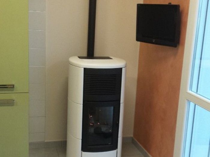 Archisio - Bagno Calore Design - Progetto Stufe e caminetti le nostre realizzazioni