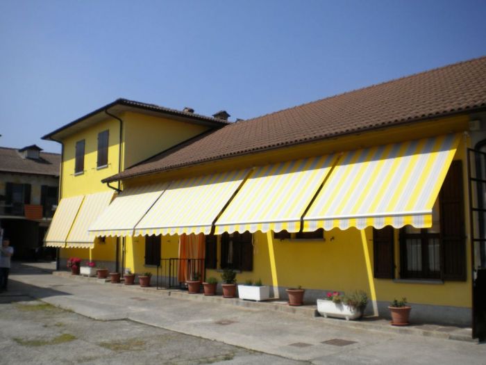 Archisio - Pezzoni Tappezzeria Tendaggi - Progetto Pergole