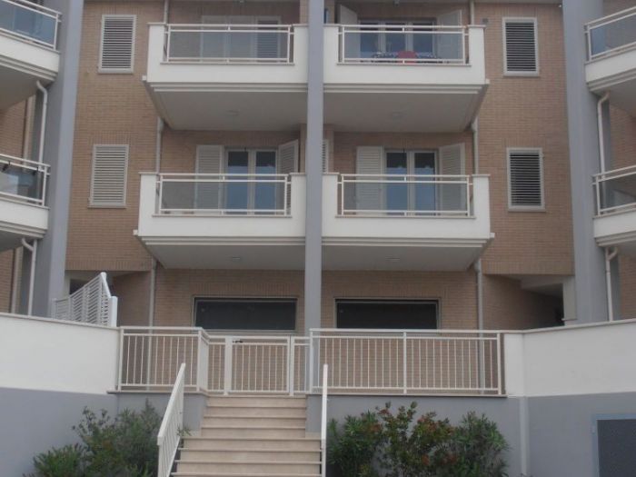 Archisio - Massimo De Luca - Progetto Edificio residenziale - commerciale