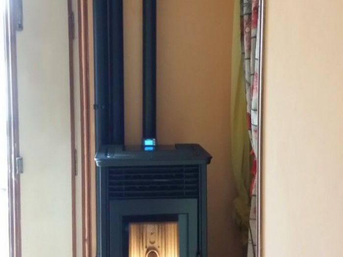 Archisio - Bagno Calore Design - Progetto Stufe e caminetti gli specialisti del calore