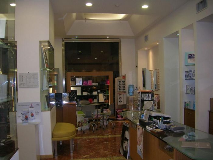Archisio - Salvatore Bottone - Progetto Arredamento negozio di ottica
