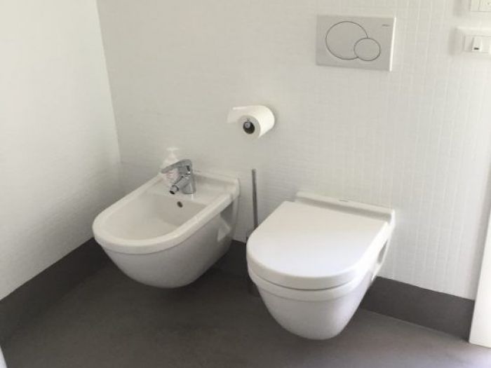 Archisio - Sofim Srl Soluzioni E Finiture Immobiliari - Progetto Pavimenti in microcemento e resina bagni in microcemento