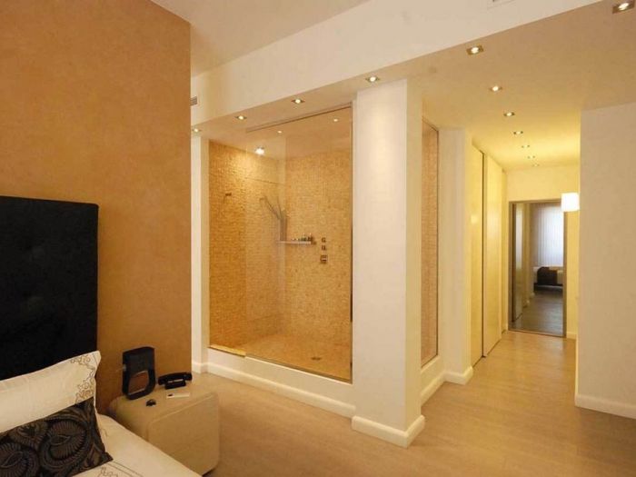 Archisio - Roberto Silvestri - Progetto Luce materiali spazio e una grande cucina