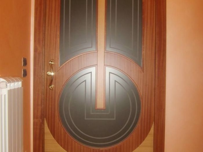 Archisio - Falegnameria Salvioli - Progetto Porta in legno