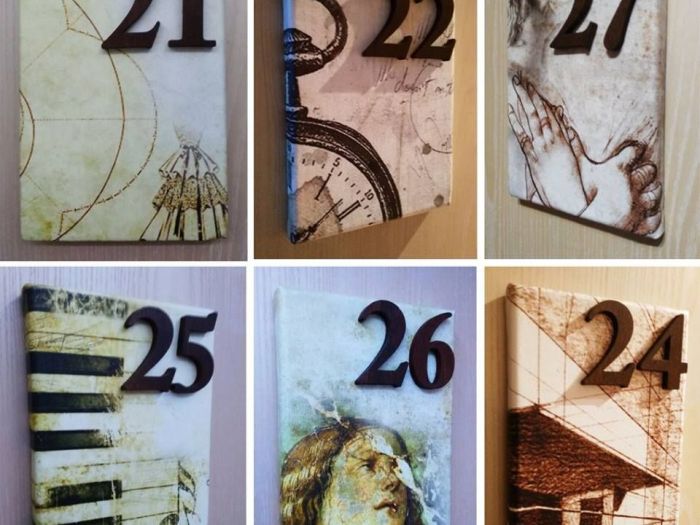 Archisio - Edodesign - Progetto Quadri presso hotel carouge e vicolo 39