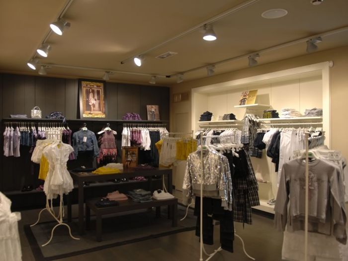 Archisio - Asso spa - Progetto Allestimento ed arredamento di negozi