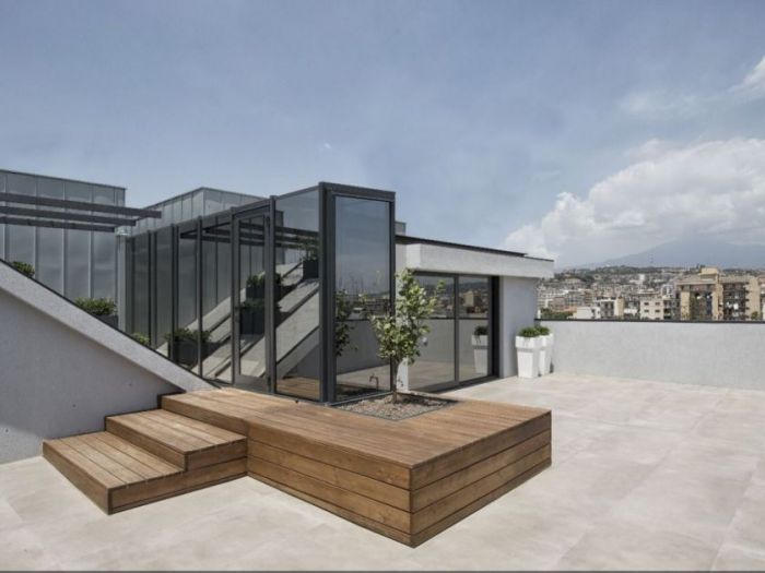 Archisio - Alfio Carmelo Lombardo - Progetto Structured attic with aluminum frames and glass titanium zinc cover
