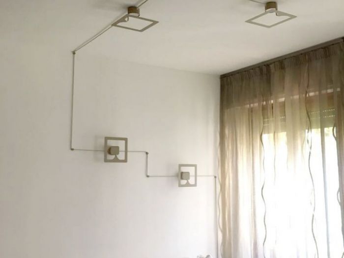 Archisio - Alessio Spinelli - Spinelli Illuminazione - Progetto Soggiorno privato