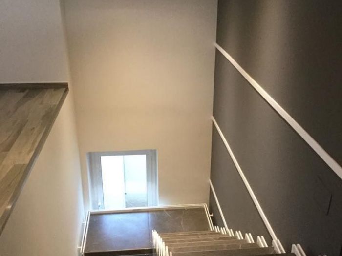 Archisio - Decora srl - Progetto Design scala interna