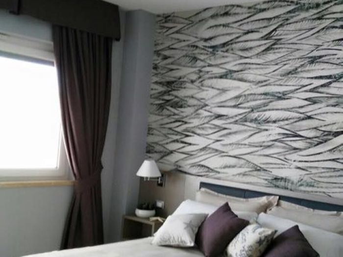 Archisio - Armonie Dinterni Sas - Progetto Letti divani e poltrone