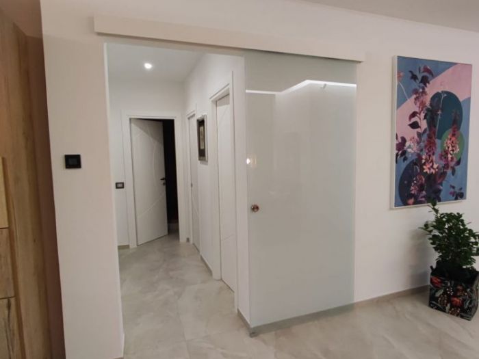 Archisio - Vincenzo Matarazzo - Progetto Ristrutturazione di una casa moderna con toni caldi ed accoglienti