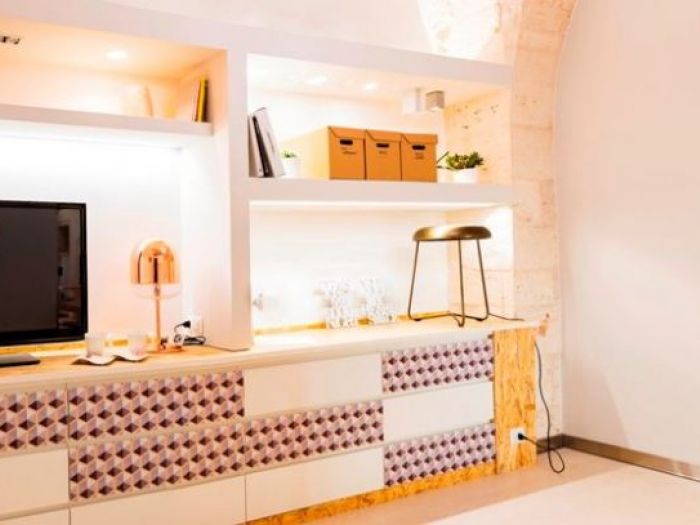 Archisio - Silvia Orlandi - Progetto Punto vendita elettronica e servizi