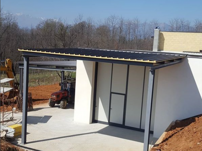 Archisio - Ironwoood - Progetto Ampliamento cantina cascina cottignano con struttura portante in heb hea chiusure con portone scorrevole