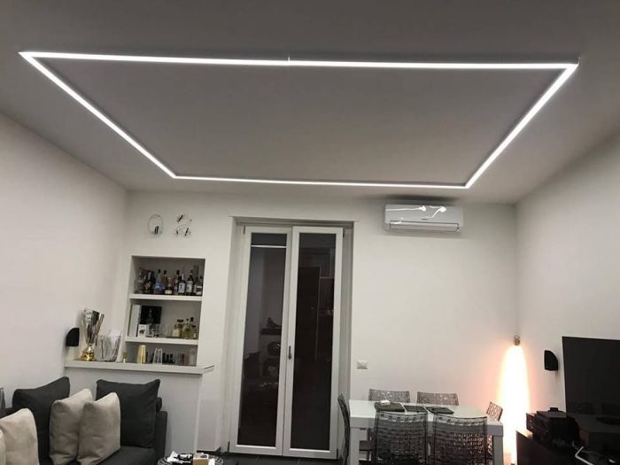 Archisio - Paola Illuminazione - Progetto Perimetro con composizione tagli led