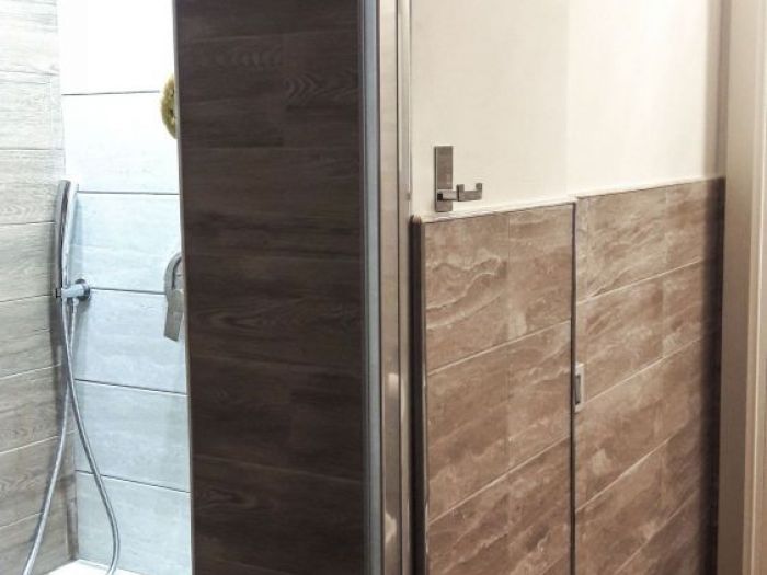 Archisio - Mc Rendering Solution - Progetto il bagno si fa in due