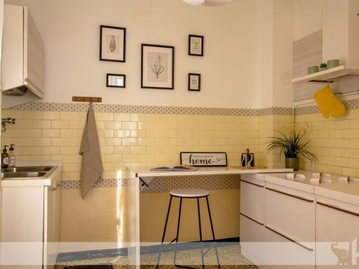 Archisio - Elisa Cattelan - Progetto Un prima e dopo su un appartamento degli anni 60