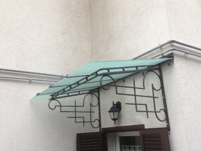 Archisio - Ferro E Fuoco - Progetto Pensiline in ferro battuto