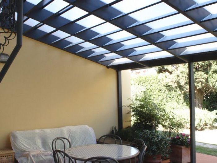 Archisio - Maurizio Moraldi - Progetto La loggia del dragoUno copertura tra due case una cerniera tra lo spazio domestico e quello celebrativo del coabitare