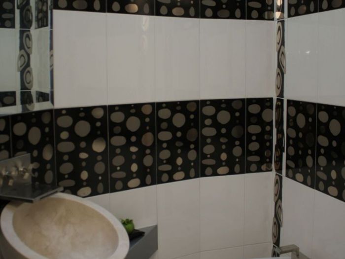 Archisio - Teresa Romeo - Progetto Bagni