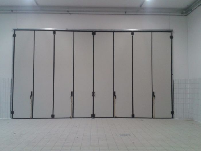 Archisio - Gr Porte - Progetto Porte industriali - porte a libro e porte scorrevoli industriali
