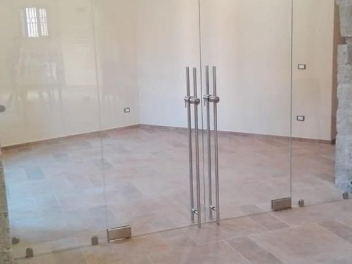 Archisio - Vetreria Vecciarelli Srl - Progetto Porte in vetro trasparente