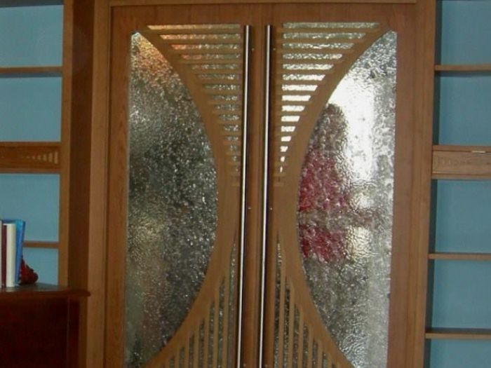 Archisio - Falegnameria Salvioli - Progetto Porta in legno con vetro