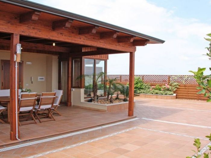 Archisio - Mario Pucciarelli - Progetto Mansarda e orto in citt