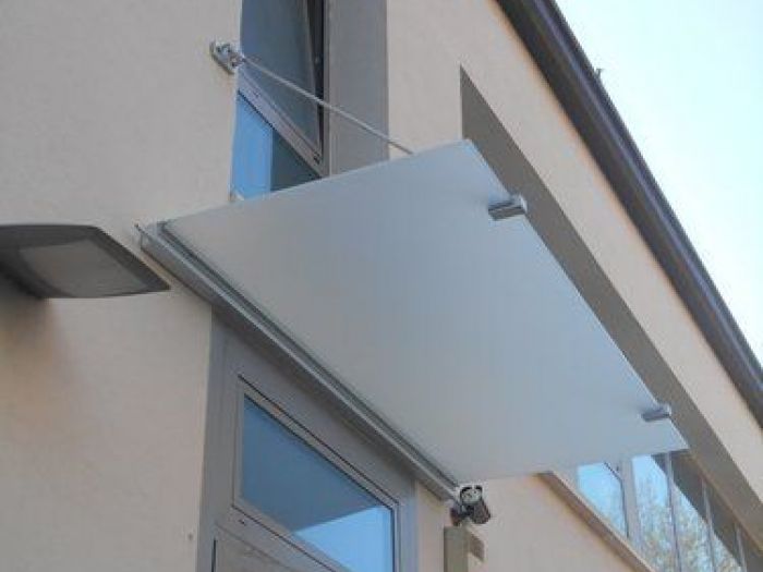 Archisio - Vetreria Dimensione Vetro - Progetto Parapetti e scale pensiline in vetro porte calpestabili e vetri decorati