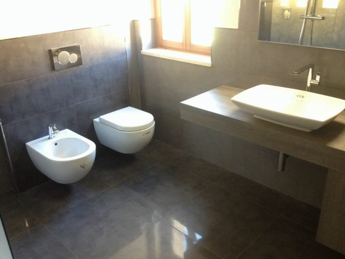 Archisio - Edilizia Giuseppe Corona - Progetto Ristrutturazioni costruzioni e pavimentazioni