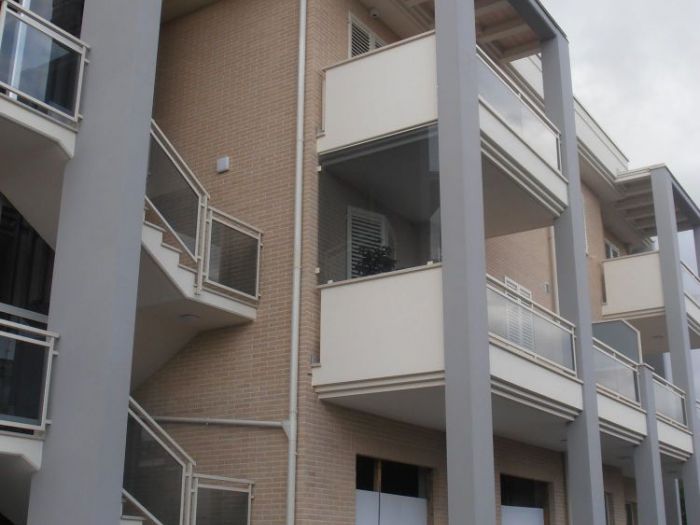 Archisio - Massimo De Luca - Progetto Edificio residenziale - commerciale