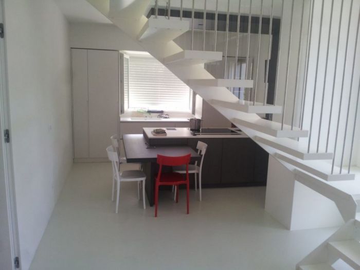 Archisio - Vaschi Restyling - Progetto Pavimenti e scale in resina