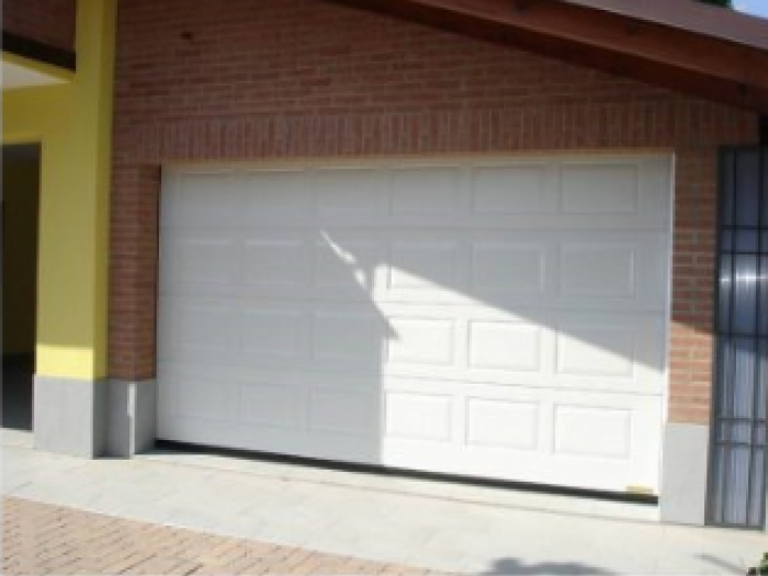 Archisio - Ferro Su Ferro - Progetto Portoni sezionali e basculanti