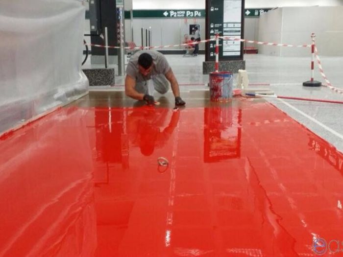 Archisio - Easyprof Decorazioni Murali - Progetto Pavimento resina a colata color rosso stand malpensa
