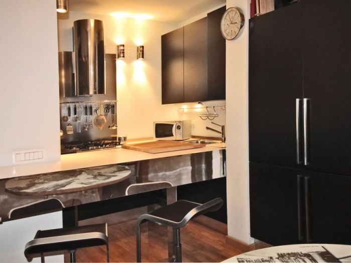 Archisio - Diletta Evangelisti - Progetto Bilocale con dettagli in vetro e metallo argento